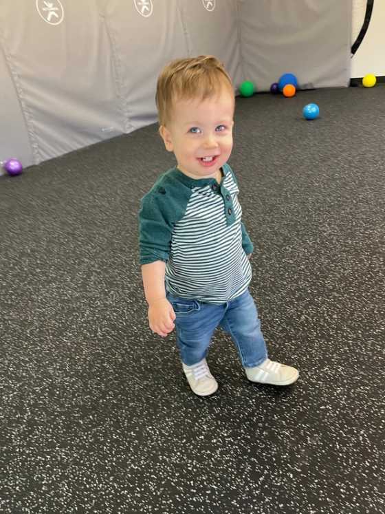 Toddler enjoying the gross motor room